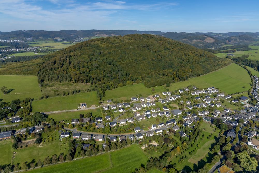 Grafschaft from above - Location view of the streets and houses of residential areas in the valley landscape surrounded by mountains on street Schulstrasse in Grafschaft at Sauerland in the state North Rhine-Westphalia, Germany