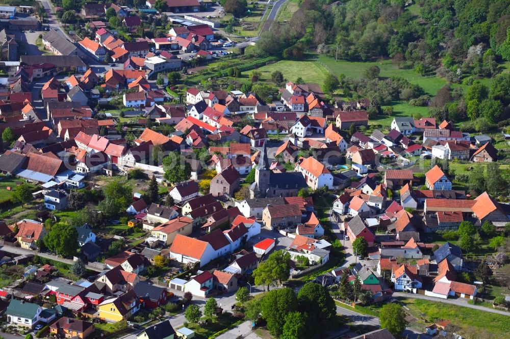 Aerial photograph Großleinungen - Location view of the streets and houses of residential areas in the valley landscape surrounded by mountains in Grossleinungen in the state Saxony-Anhalt, Germany