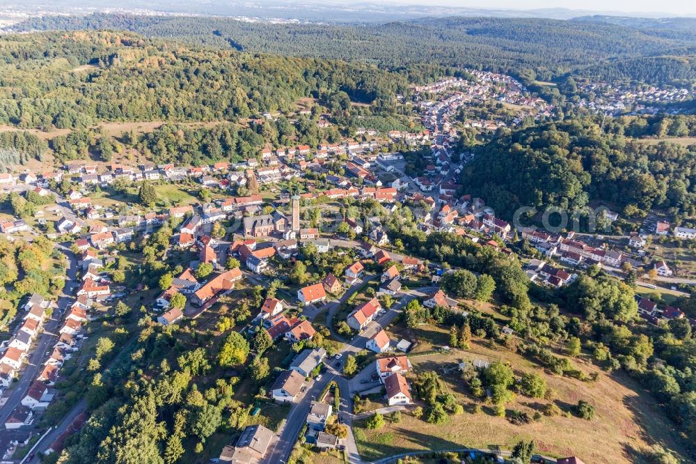Aerial image Kirrberg - Location view of the streets and houses of residential areas in the valley landscape surrounded by mountains in Kirrberg in the state Saarland, Germany