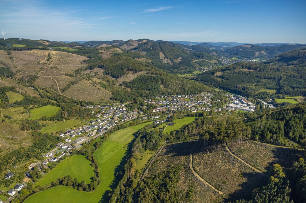 Aerial photograph Langenei - Location view of the streets and houses of residential areas in the valley landscape surrounded by mountains in Langenei in the state North Rhine-Westphalia, Germany