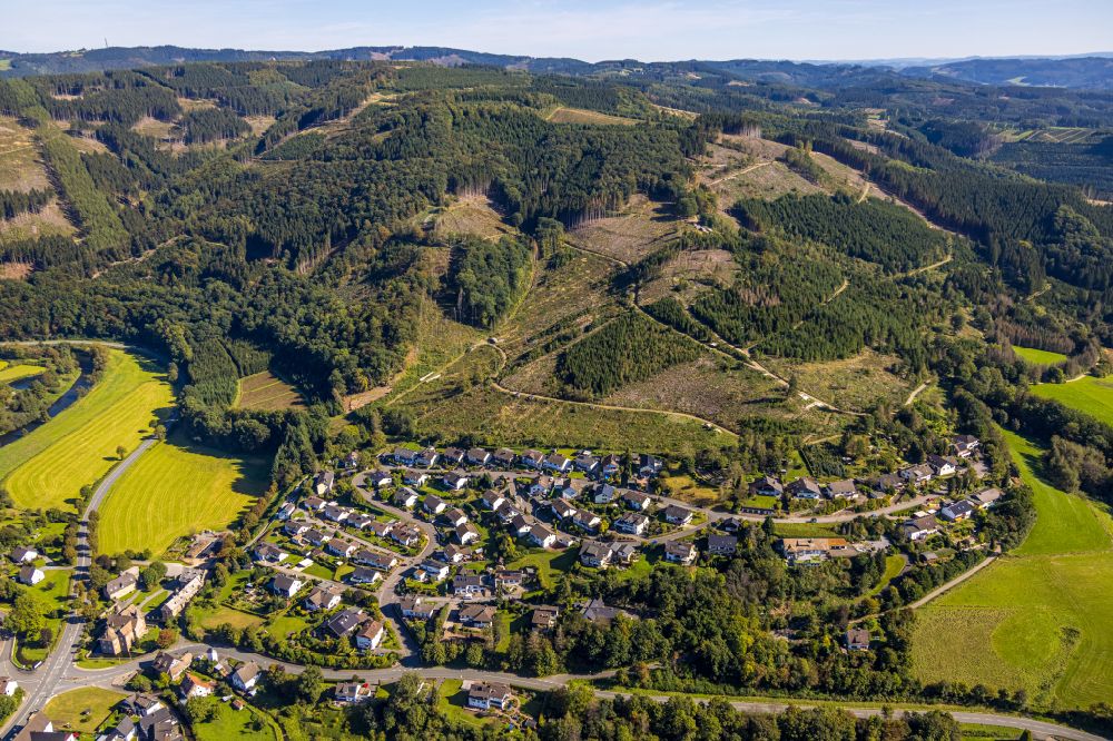 Aerial photograph Lenhausen - Location view of the streets and houses of residential areas in the valley landscape surrounded by mountains in Lenhausen in the state North Rhine-Westphalia, Germany