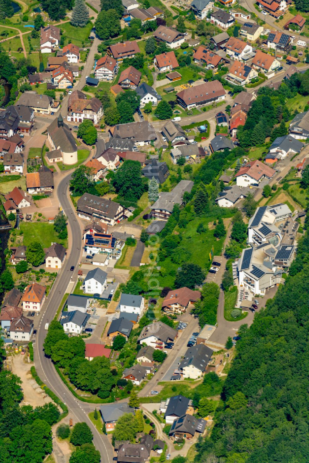 Oberprechtal from above - Location view of the streets and houses of residential areas in the valley landscape surrounded by mountains in Oberprechtal in the state Baden-Wuerttemberg, Germany