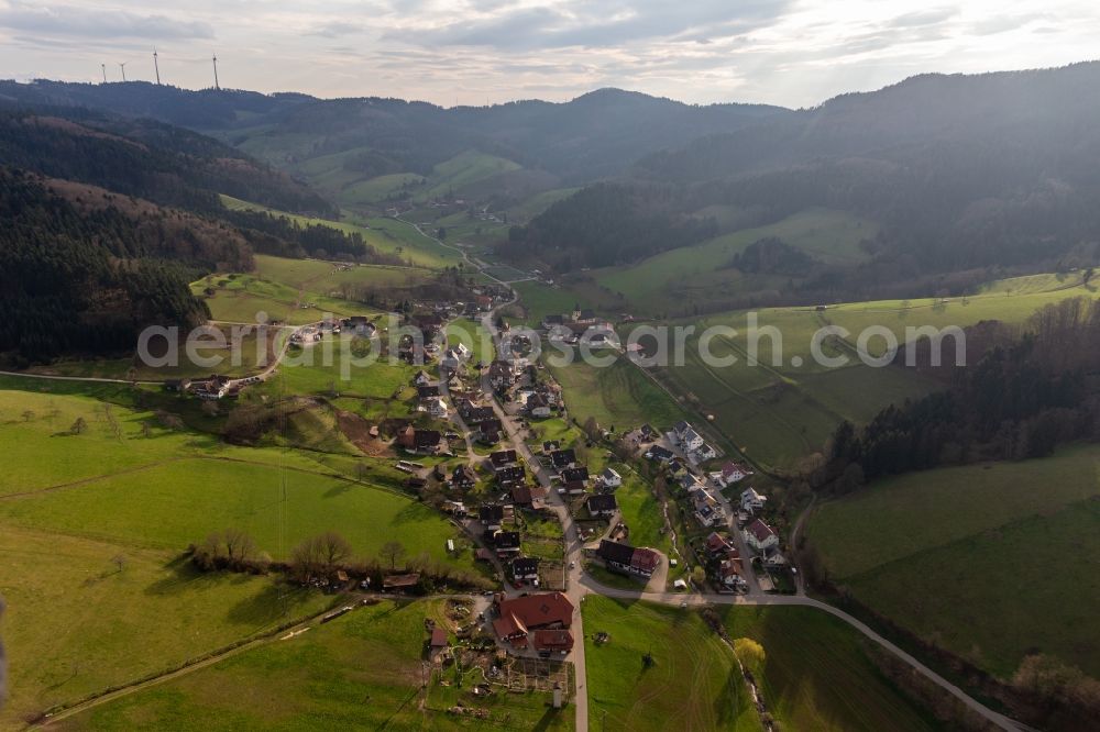 Prinzbach from the bird's eye view: Location view of the streets and houses of residential areas in the valley landscape surrounded by mountains of the black forest in Prinzbach in the state Baden-Wuerttemberg, Germany