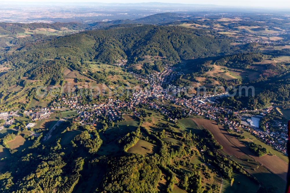 Aerial image Reichenbach - Location view of the streets and houses of residential areas in the valley landscape surrounded by mountains in Reichenbach in the state Hesse, Germany