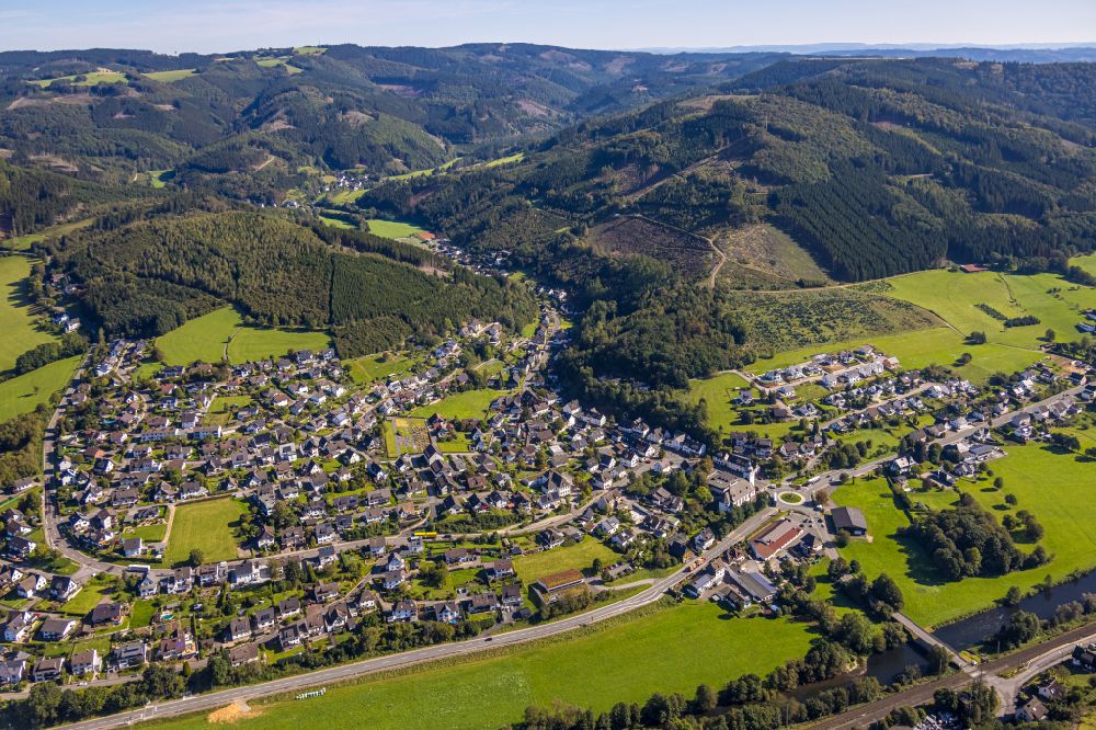 Aerial image Rönkhausen - Location view of the streets and houses of residential areas in the valley landscape surrounded by mountains in Roenkhausen in the state North Rhine-Westphalia, Germany