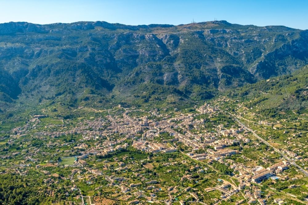 Aerial image Soller - Location view of the streets and houses of residential areas in the valley landscape surrounded by mountains in Soller in Balearic island of Mallorca, Spain