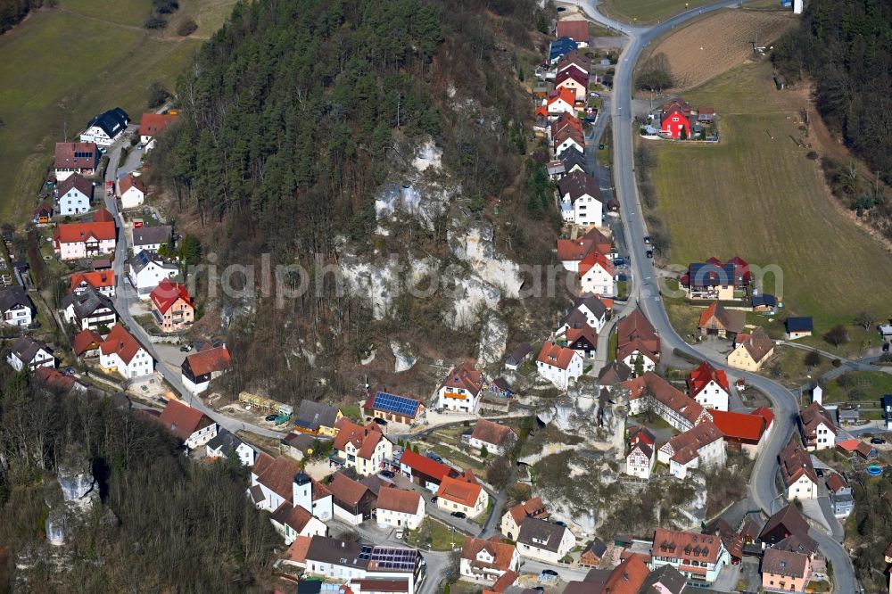 Aerial image Tüchersfeld - Location view of the streets and houses of residential areas in the valley landscape surrounded by mountains in Tuechersfeld in the state Bavaria, Germany