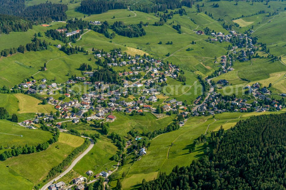 Todtnauberg from above - Location view of the streets and houses of residential areas in the valley landscape surrounded by mountains in Todtnauberg in the state Baden-Wuerttemberg, Germany