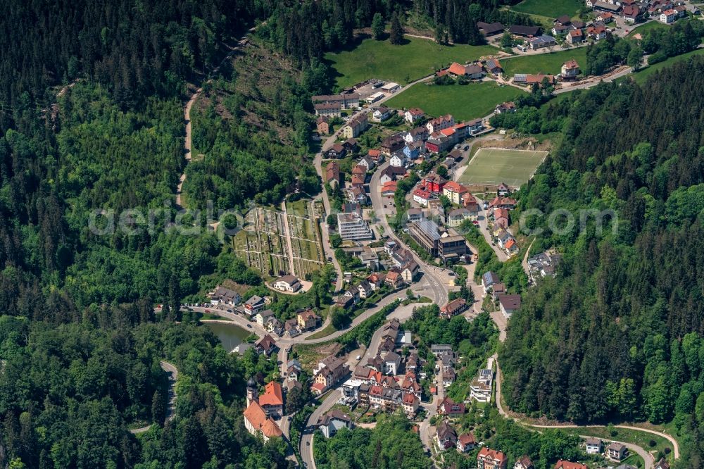 Schonach im Schwarzwald from above - Location view of the streets and houses of residential areas in the valley landscape surrounded by mountains in Schonach im Schwarzwald in the state Baden-Wuerttemberg, Germany