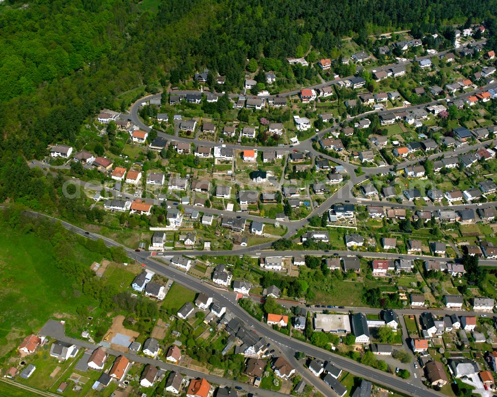 Uckersdorf from the bird's eye view: Town View of the streets and houses of the residential areas in Uckersdorf in the state Hesse, Germany