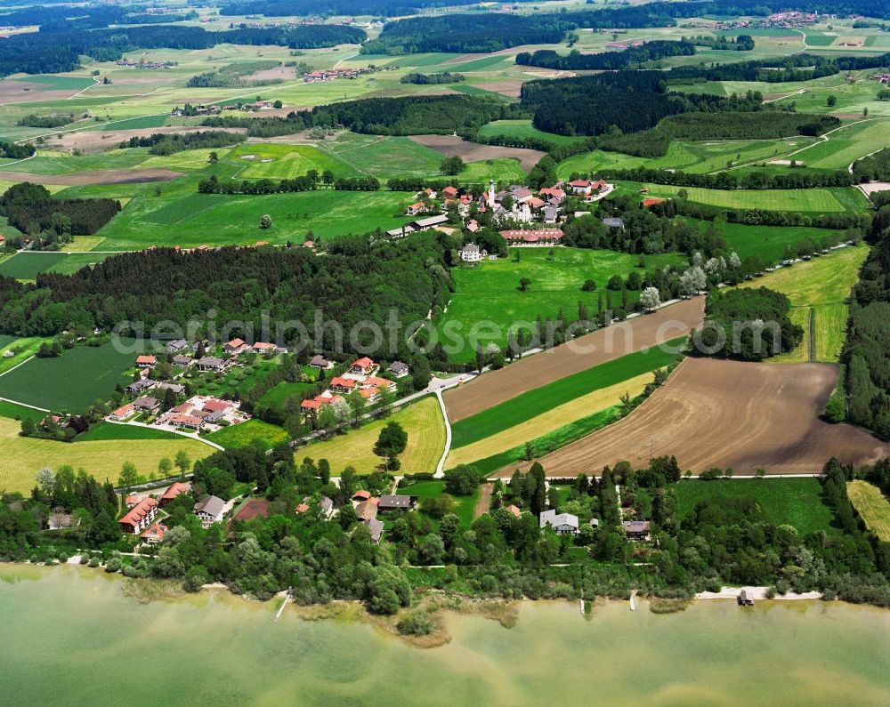 Chieming from the bird's eye view: Local view on the banks of Lake Chiemsee in the municipality of Arlaching in the state of Bavaria, Germany