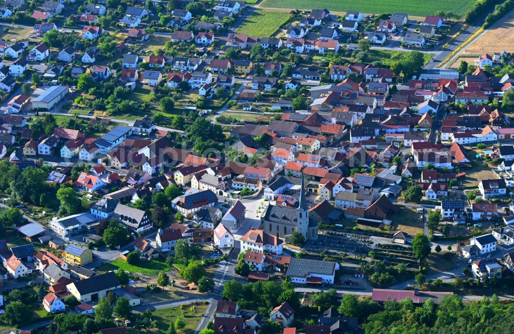 Wollbach from above - Town View of the streets and houses of the residential areas in Wollbach in the state Bavaria, Germany