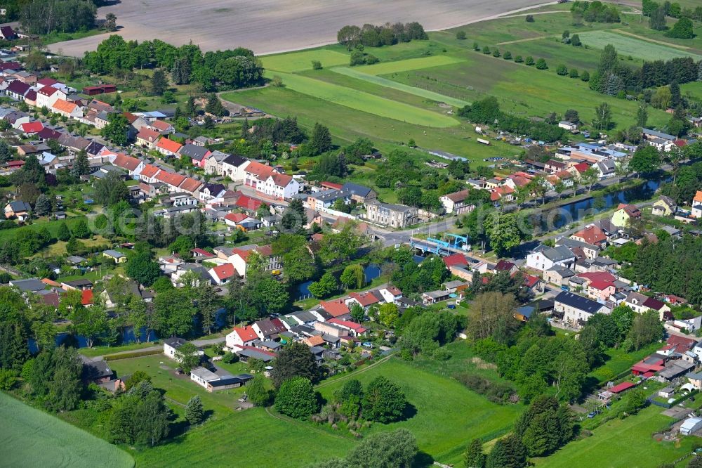 Aerial photograph Zerpenschleuse - Town View of the streets and houses of the residential areas along L100 in Zerpenschleuse in the state Brandenburg, Germany