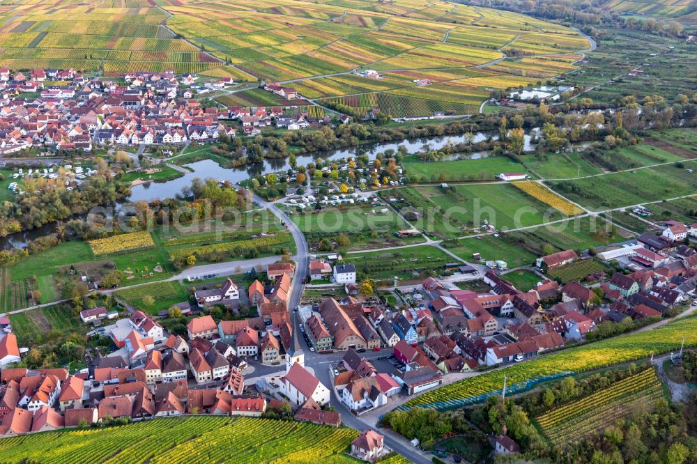Escherndorf from the bird's eye view: Town center on the edge of vineyards and wineries in the wine-growing area in Escherndorf in the state Bavaria, Germany