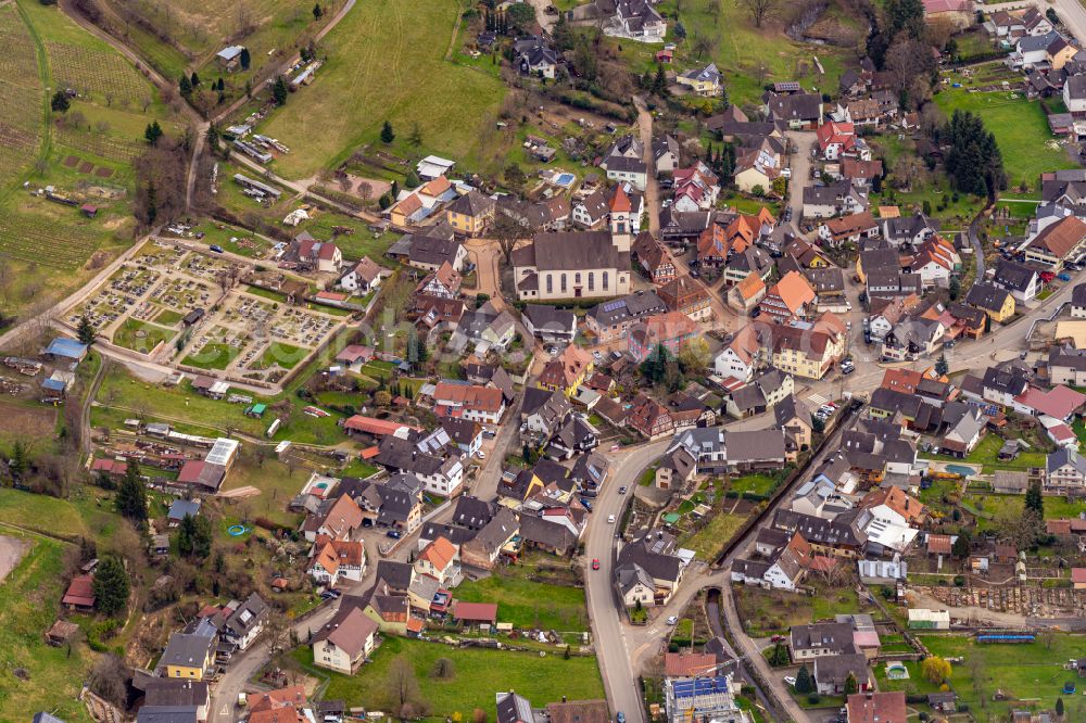 Münchweier from above - Town center on the edge of vineyards and wineries in the wine-growing area on street Hauptstrasse in Muenchweier in the state Baden-Wuerttemberg, Germany