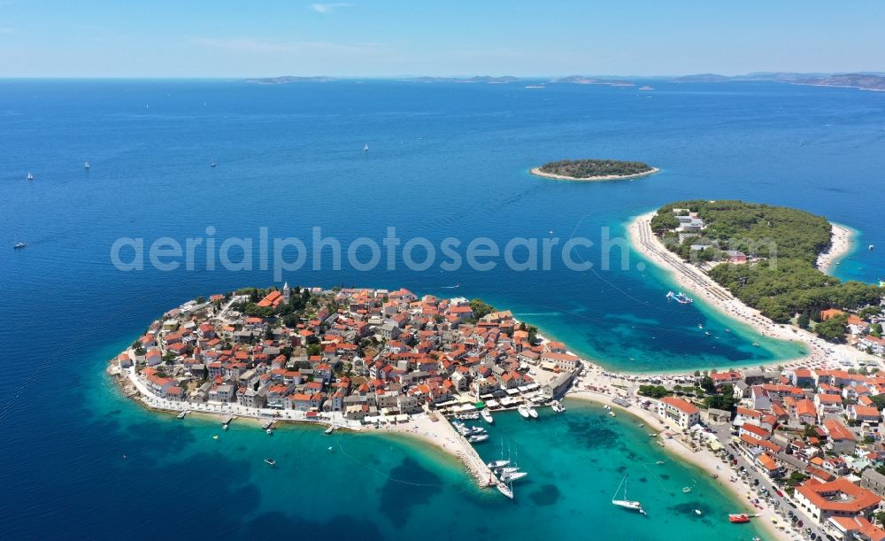 Aerial image Primosten - Town center on the sea-coastal area of ?? Adriatic Sea in Primosten in Sibensko-kninska zupanija, Croatia