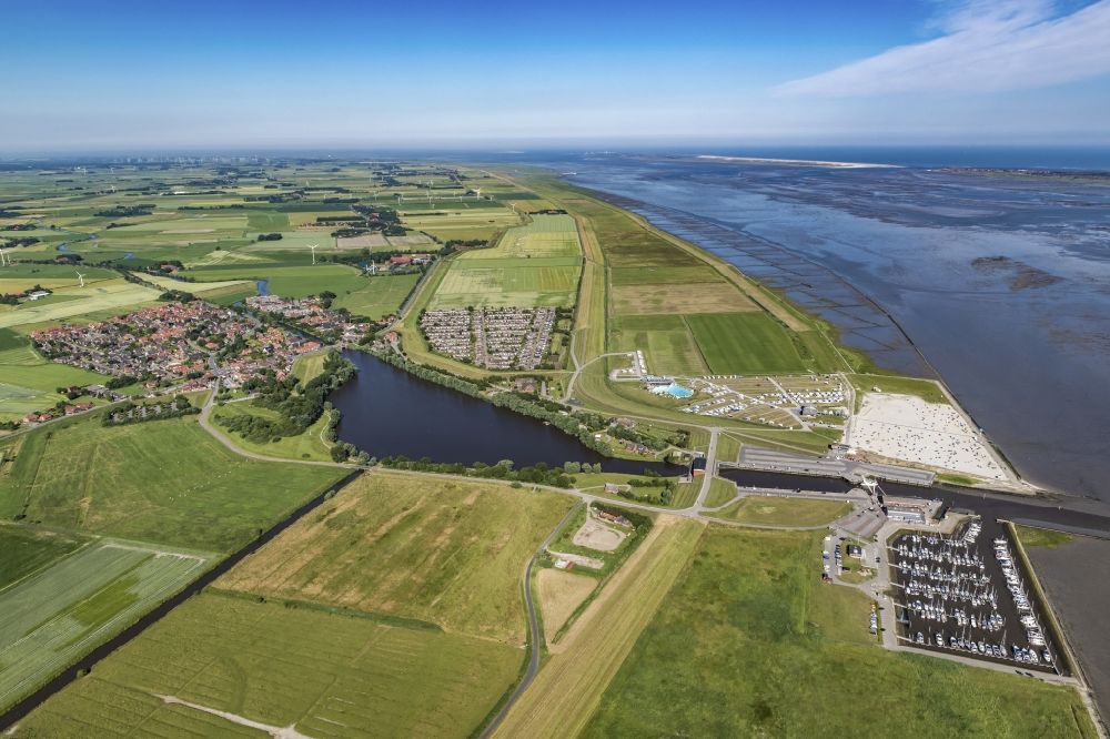 Aerial photograph Dornum - Center on the seacoast of North Sea in Dornumersiel in the state Lower Saxony