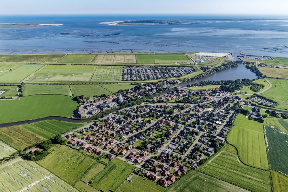 Aerial image Dornum - Center on the seacoast of North Sea in Dornumersiel in the state Lower Saxony