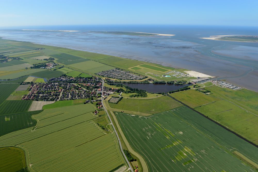 Dornumersiel from above - Center on the seacoast of North Sea in Dornumersiel in the state Lower Saxony, Germany