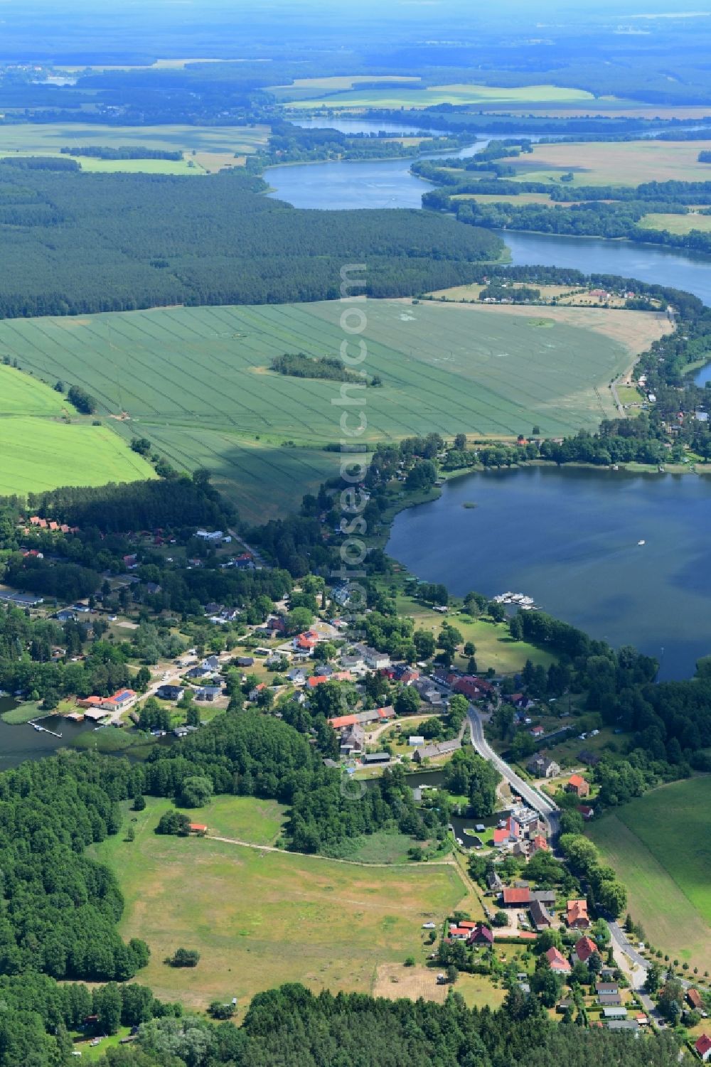 Aerial image Canow - Village on the banks of the area of Canower See in Canow in the state Mecklenburg - Western Pomerania, Germany