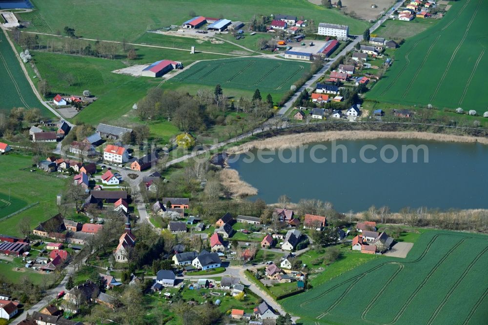 Aerial image Wollin - Village on the banks of the area lake of Dorfsee in Wollin in the state Mecklenburg - Western Pomerania, Germany