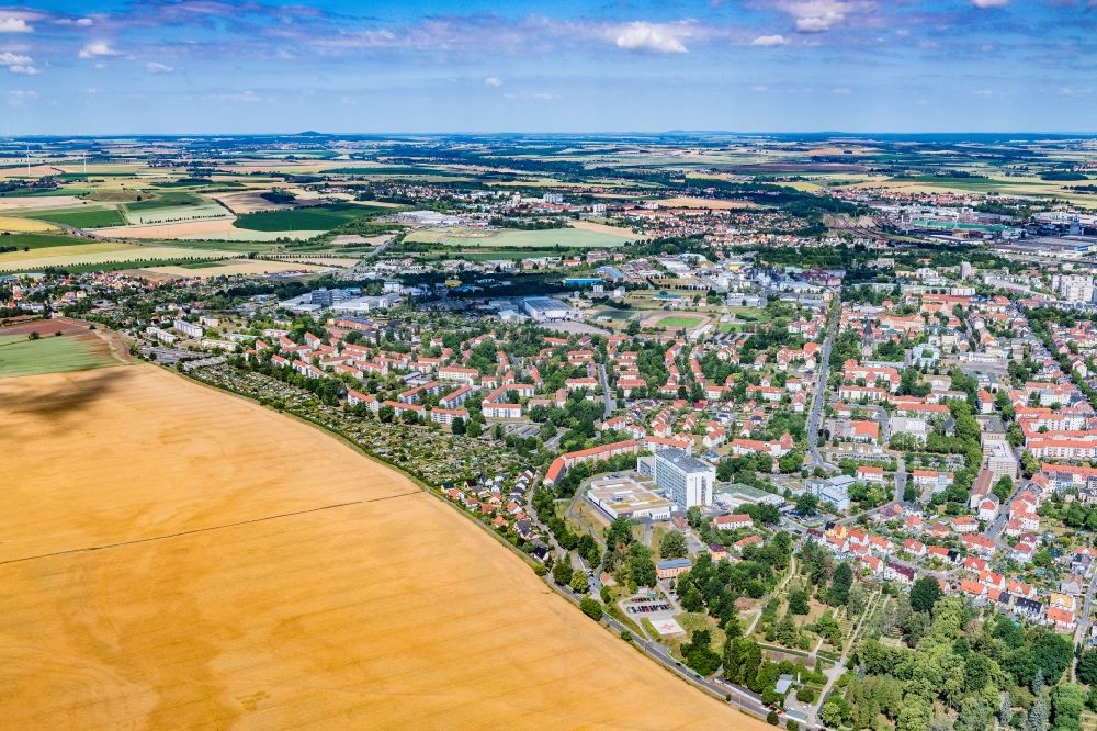 Riesa from the bird's eye view: Village on the banks of the area Elbe - river course in Riesa in the state Saxony, Germany