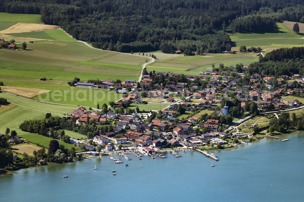 Gstadt am Chiemsee from the bird's eye view: Village on the banks of the area lake on street Seestrasse in Gstadt am Chiemsee in the state Bavaria, Germany