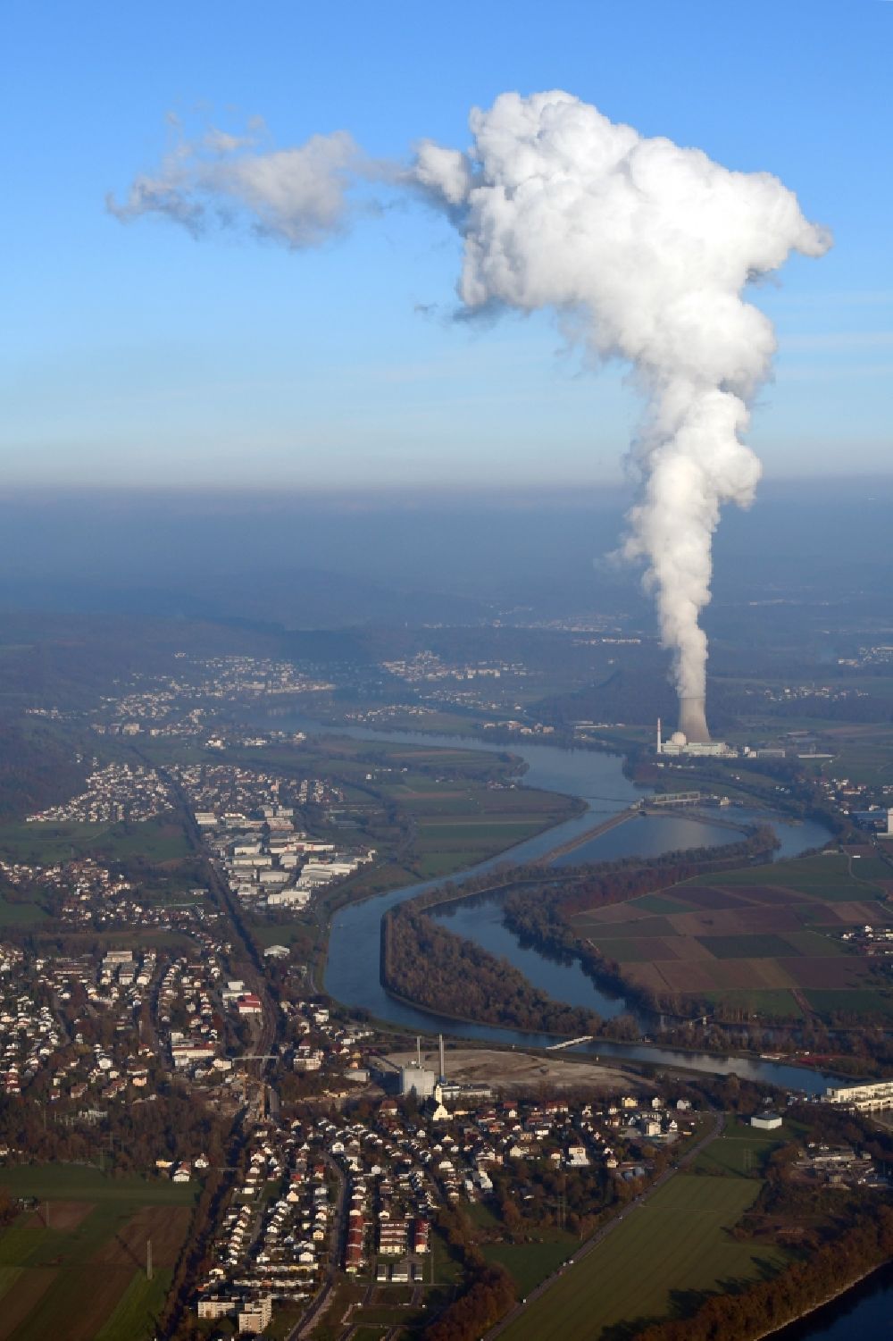Aerial photograph Albbruck - Village on the banks of the Rhine - river in Albbruck in the state Baden-Wurttemberg, Germany. Steam column of the nuclear power station KKL Leibstadt in Switzerland