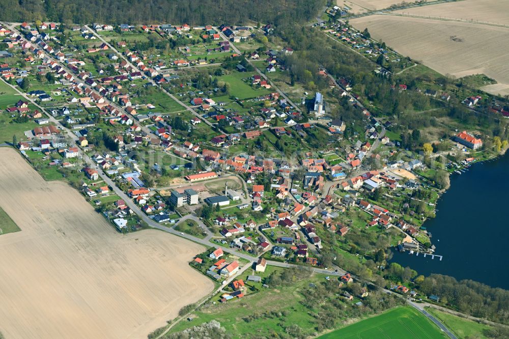 Aerial image Flecken Zechlin - Village on the banks of the area lake Schwarzer See on street Weinbergsring in Flecken Zechlin in the state Brandenburg, Germany