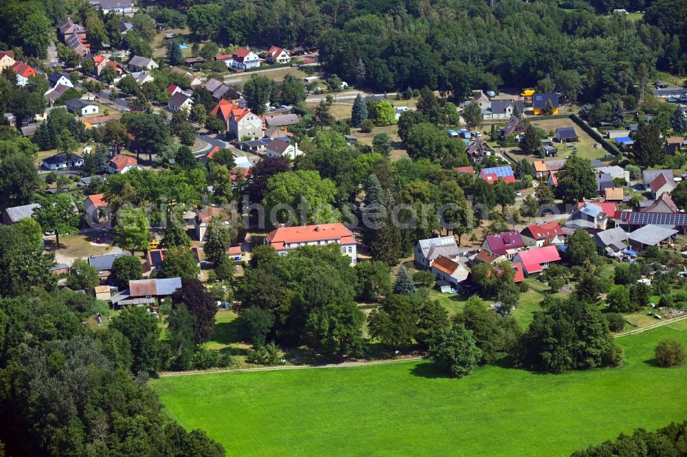 Aerial image Blossin - Village on the banks of the area lake Wolziger See in Blossin in the state Brandenburg, Germany
