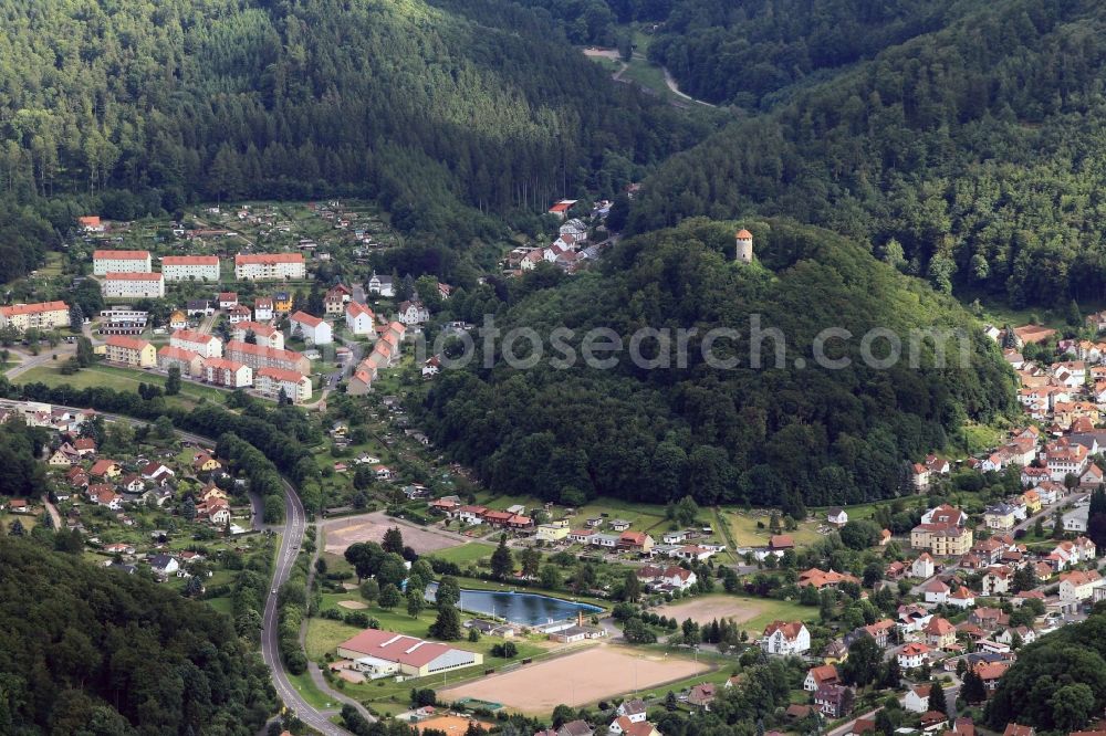 Thal from above - The place Thal is a district of the city Ruhla in state of Thuringia. Nestled in the Thuringian Forest flows through the valley of the river Erbstrom. On a prominent mountain peak stands the ruined Scharfenburg. From the former fortress from the 12th century still stands the keep, which is now used as a lookout
