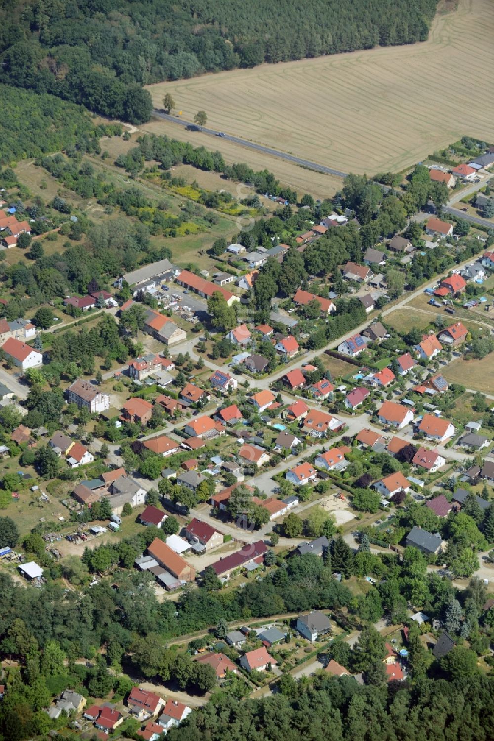 Rietz-Neuendorf from the bird's eye view: View of the Alt-Golm part in the North of the borough of Rietz-Neuendorf in the state of Brandenburg. The residential village is surrounded by fields and forest