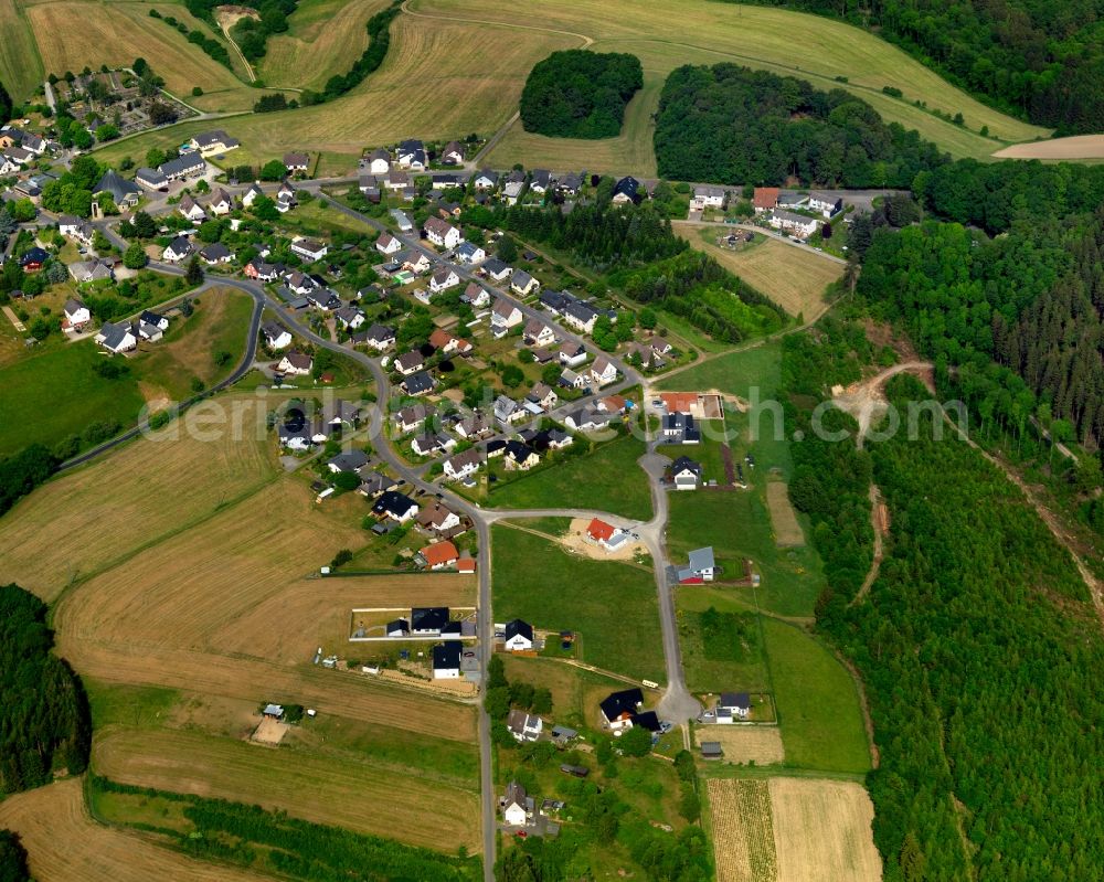 Aerial image Birken-Honigsessen - View of the Birken part of Birken-Honigsessen in the state of Rhineland-Palatinate. The centre of the municipiality consists of two separate but now connected villages: Birken and Honigsessen. The borough is located in the Wildenburger Land region and is surrounded by wooded hills and fields