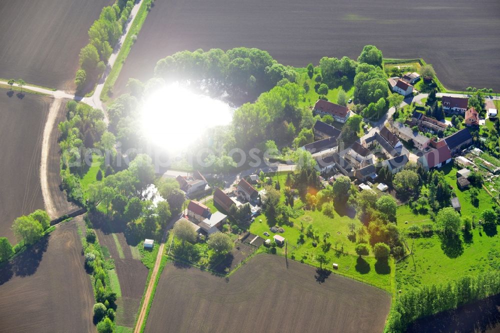 Elsteraue from above - View of the Krimmitzschen part of the locality of Rehmsdorf in Elsteraue in the state of Saxony-Anhalt. The borough and municipiality Elsteraue is located on Weisse Elster river in the Burgenland county district. Krimmitzschen consists of agricultural land, estates and a small pond