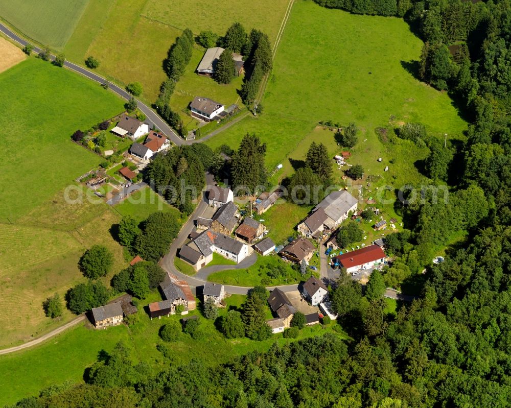 Asbach from above - View of the Krumbach part of Asbach in the state of Rhineland-Palatinate. The borough and municipiality Asbach is located in the county district of Neuwied in the Niederwesterwald forest region between the Nature parks Rhine-Westerwald and Bergisches Land. Krumbach today is a residential hamlet and farm estate on the creek of the same name