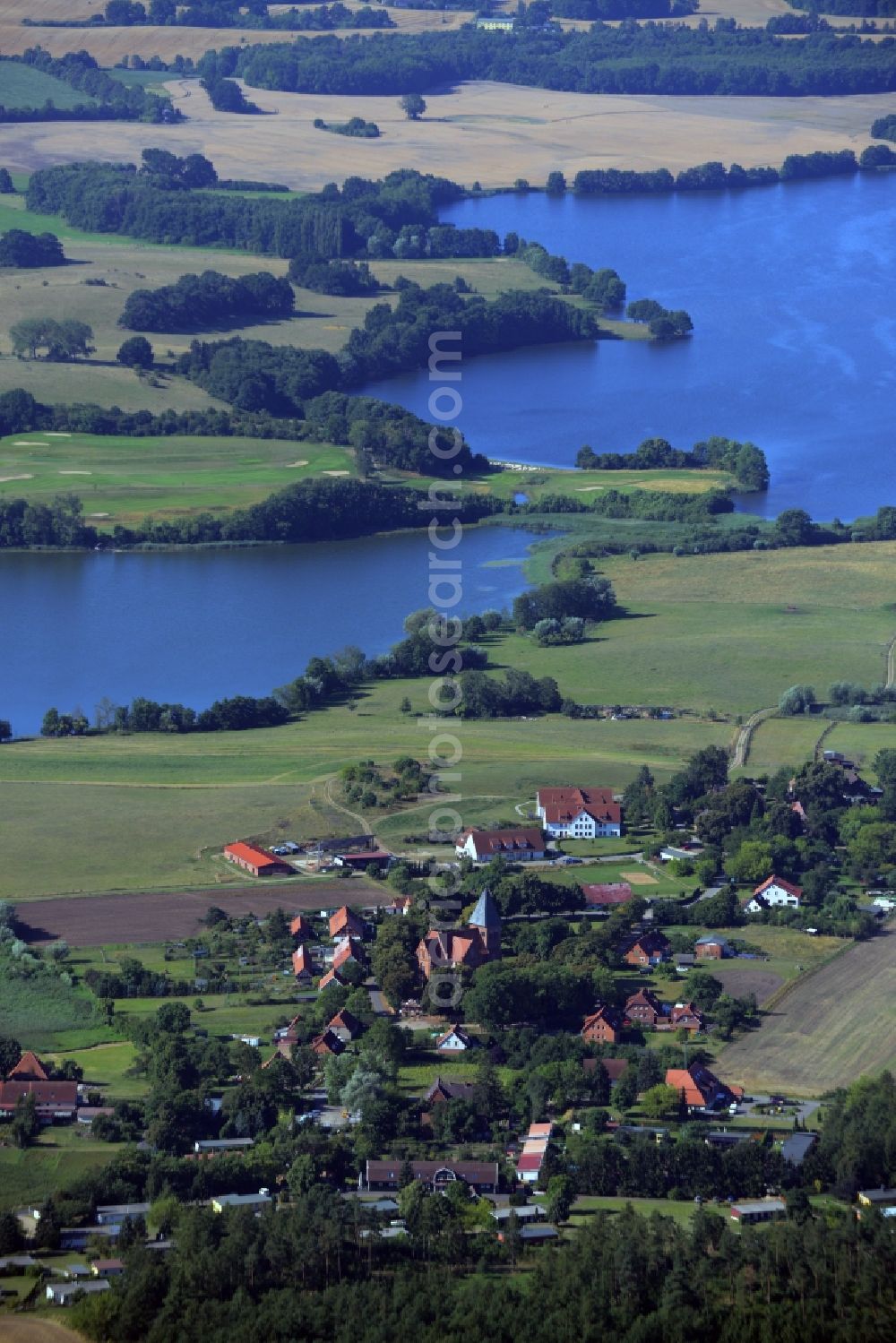 Aerial image Kuchelmiß - View of the Serrahn part of the Krakow Lake District in the borough of Kuchelmiss in the state of Mecklenburg - Western Pomerania. The landscape consists of several lakes and islands. Serrahn is located on the shore of Lake Serrahner See and Krakow Untersee in the background