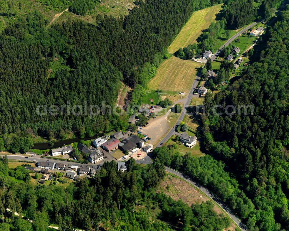 Aerial image Kempfeld - View of the hamlet of Katzenloch in Kempfeld in the state of Rhineland-Palatinate. The borough and municipiality is an official spa resort and located in the county district of Birkenfeld, in the Hunsrueck region. It is surrounded by agricultural land, meadows and forest and includes three hamlets such as Katzenloch