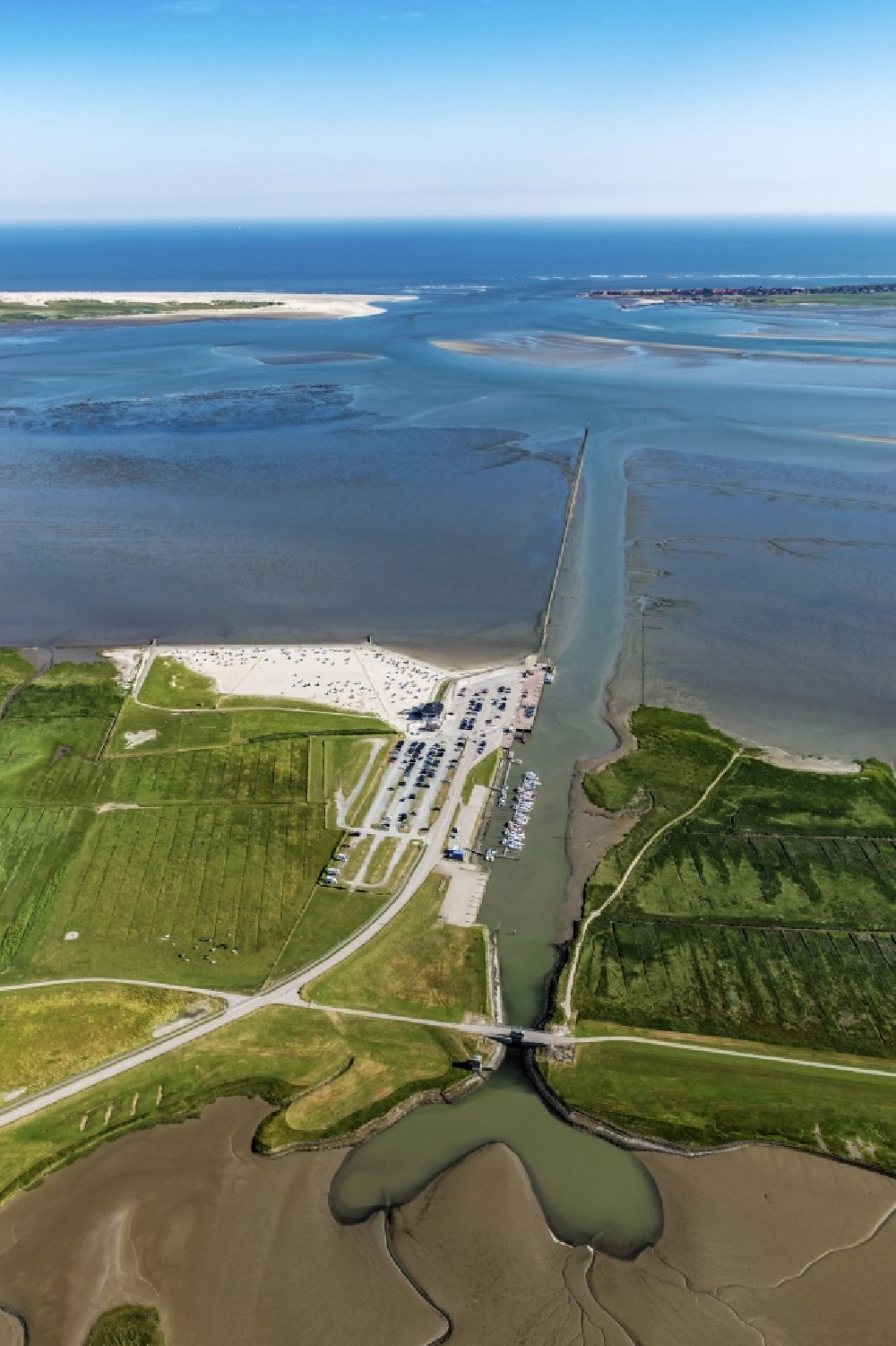 Dornum from above - East Frisian coast near Nessmersiehl in the state of Lower Saxony. The community Dorum is located in Ostfriesland on the North Sea coast. Along the coastline extends the Lower Saxony Wadden Sea National Park, which has been a UNESCO World Heritage Site since 2009. The landscape is characterized by the Wadden Sea, agriculture and fields