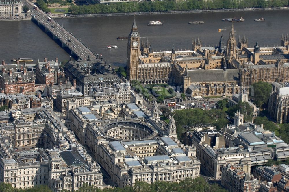 London from above - View of the Palace of Westminster / Westminster Palace in London. monumental, neo-Gothic style building in London where the meeting consists of the House of Commons and the House of Lords, British Parliament. This is under the UNESCO World Heritage landmark located in the City of Westminster on Parliament Square, close to government buildings at Whitehall. The most famous part of the palace is the Clock Tower (Clock Tower), with the bell Big Ben