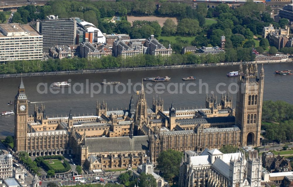 London from the bird's eye view: View of the Palace of Westminster / Westminster Palace in London. monumental, neo-Gothic style building in London where the meeting consists of the House of Commons and the House of Lords, British Parliament. This is under the UNESCO World Heritage landmark located in the City of Westminster on Parliament Square, close to government buildings at Whitehall. The most famous part of the palace is the Clock Tower (Clock Tower), with the bell Big Ben