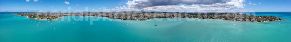 Aerial image Grand Baie - Panoramic perspective water surface at the bay along the sea coast Grand Bay in Grand Baie in Riviere du Rempart, Mauritius