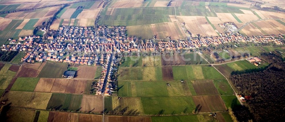 Aerial photograph Freckenfeld - Panoramic perspective Village - view on the edge of agricultural fields and farmland in Freckenfeld in the state Rhineland-Palatinate
