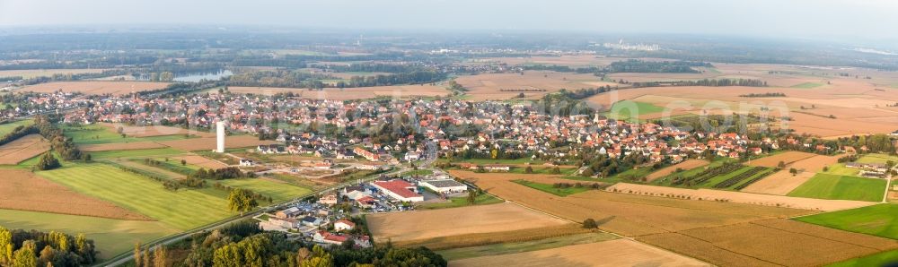 Roeschwoog from above - Panoramic perspective Village - view on the edge of agricultural fields and farmland in Roeschwoog in Grand Est, France