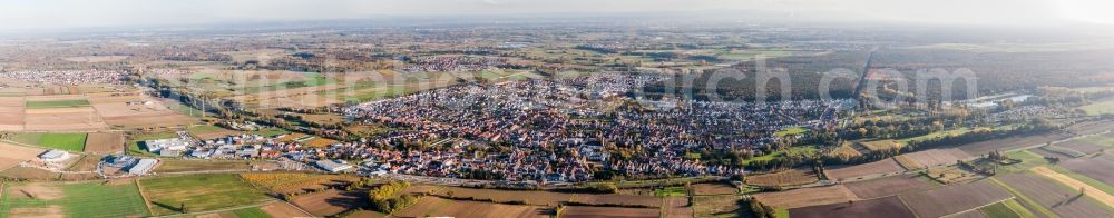 Aerial photograph Rülzheim - Panoramic perspective Town View of the streets and houses of the residential areas in Ruelzheim in the state Rhineland-Palatinate, Germany