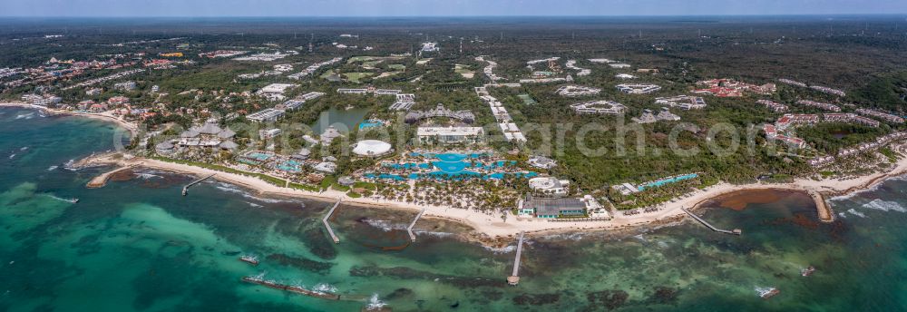 Aerial image Cancun - Panoramic perspective parasol - rows on the sandy beach in the coastal area Cancun in Playa Paraiso in Quintana Roo, Mexico
