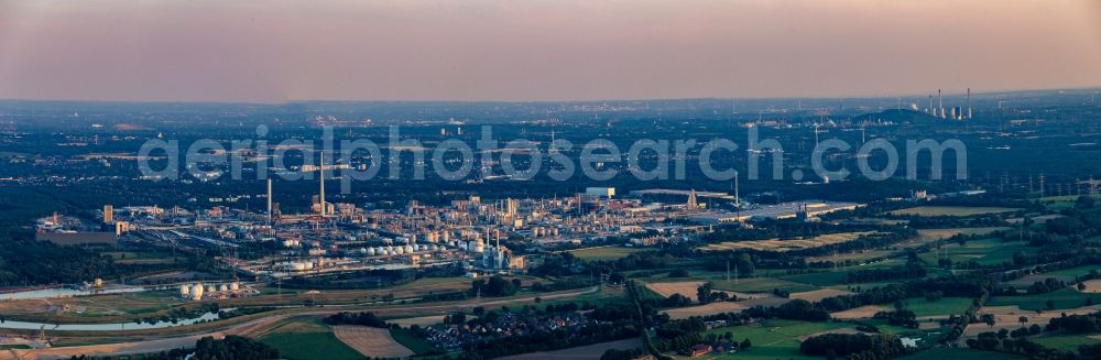 Aerial image Marl - Panoramic perspective of the building and production halls on the premises of the chemical manufacturers Chemiepark Marl on Paul-Baumann Strasse during dawn in Marl in the state North Rhine-Westphalia, Germany