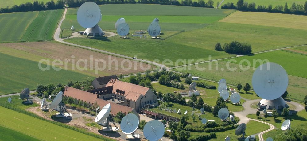 Fuchsstadt from above - Parbola antennas in the form of white satellite dishes on the site of the earth station in Fuchsstadt in the state Bavaria, Germany