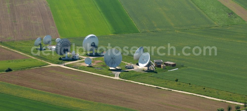 Aerial image Fuchsstadt - Parbola antennas in the form of white satellite dishes on the site of the earth station in Fuchsstadt in the state Bavaria, Germany