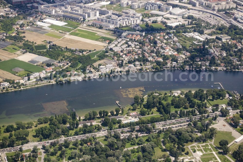 Wien from the bird's eye view: Donaupark and public baths on the riverbank of the Old Danube in the Kaisermuehlen part of the district of Donaustadt in Vienna in Austria