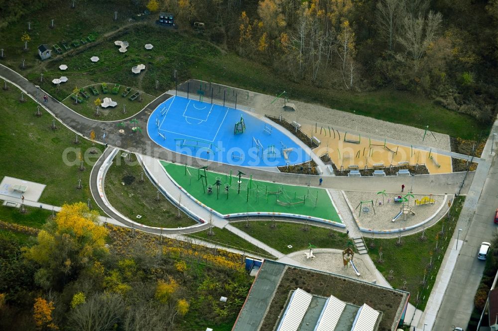 Berlin from above - Park with playground with sandy areas Kietzpark Schoenagelstrasse in the district Marzahn in Berlin, Germany
